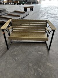 Wooden slatted bench with metal frame Wooden slatted bench with metal frame in warehouse